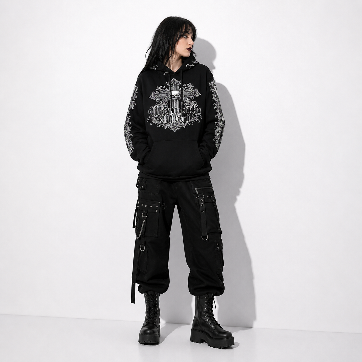 black gothic hoodie with skull and ornament print worn by model dark aesthetic look