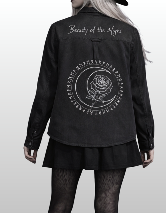 Women in black denim with gothic patchwork